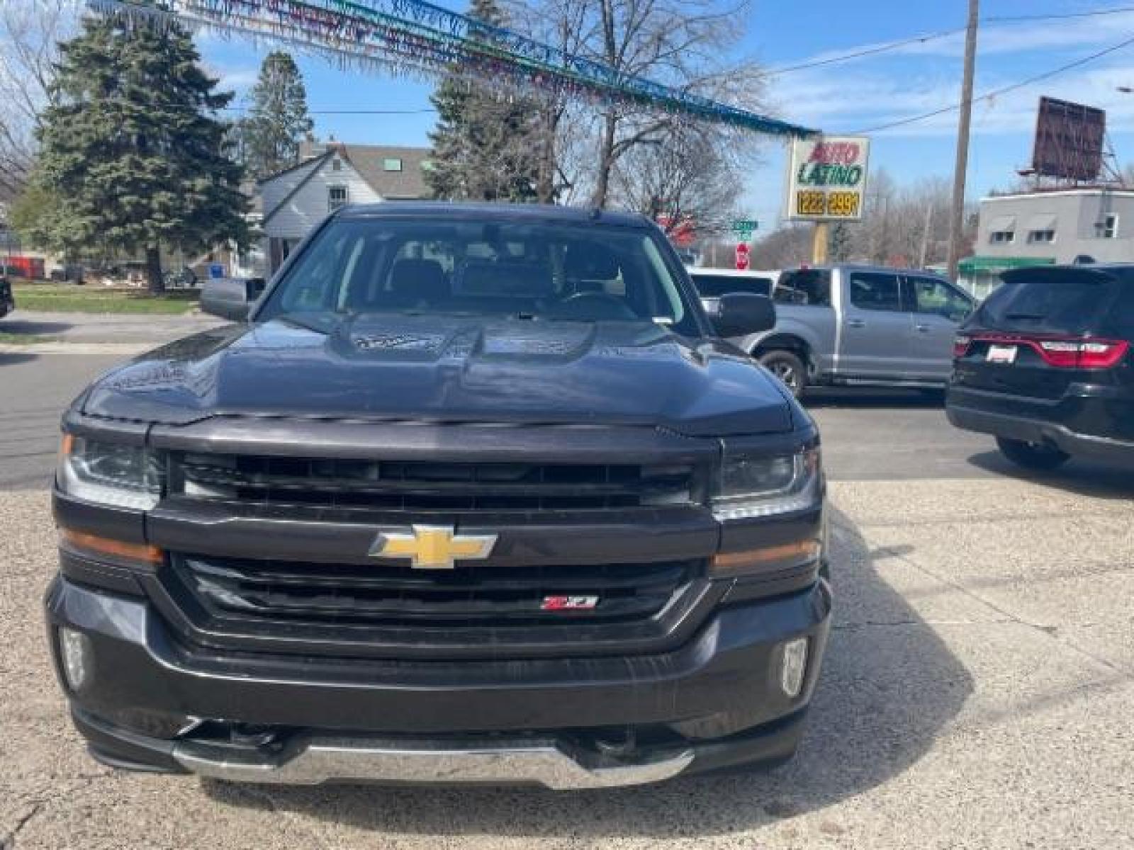 2016 Black /Jet Black, cloth Chevrolet Silverado 1500 LT Double Cab 4WD (1GCVKREC3GZ) with an 5.3L V8 OHV 16V engine, 6-Speed Automatic transmission, located at 3301 W Hwy 13, Burnsville, MN, 55337, (952) 460-3200, 44.775333, -93.320808 - Photo #0