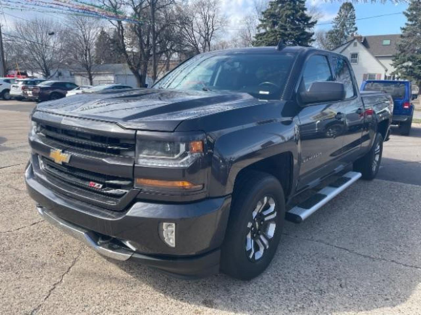 2016 Black /Jet Black, cloth Chevrolet Silverado 1500 LT Double Cab 4WD (1GCVKREC3GZ) with an 5.3L V8 OHV 16V engine, 6-Speed Automatic transmission, located at 3301 W Hwy 13, Burnsville, MN, 55337, (952) 460-3200, 44.775333, -93.320808 - Photo #1